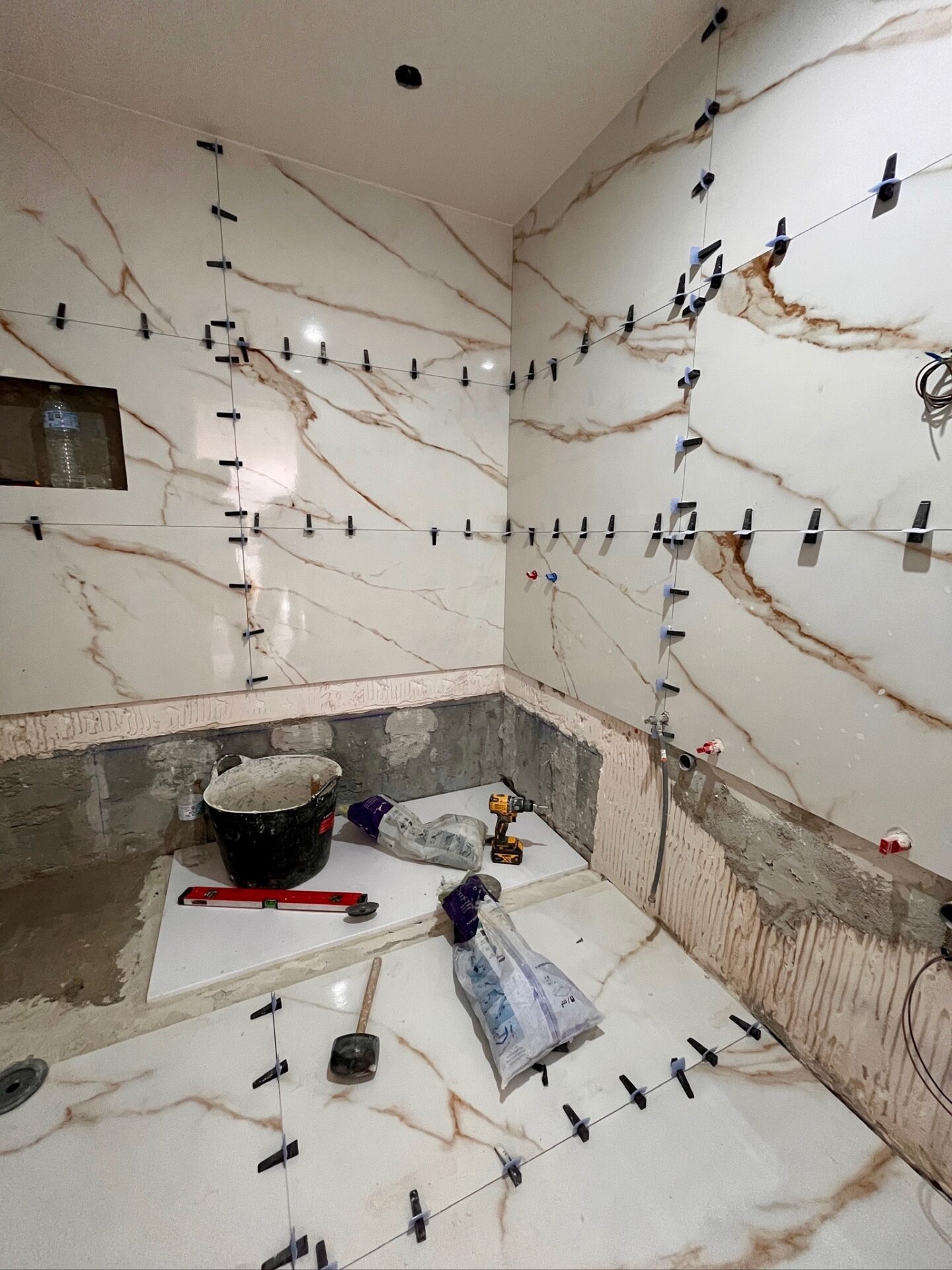 Bathroom wall and tile installation during renovation